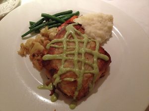 Tilapia in Phyllo, crab and pecans stuffing with spring onion vinaigrette